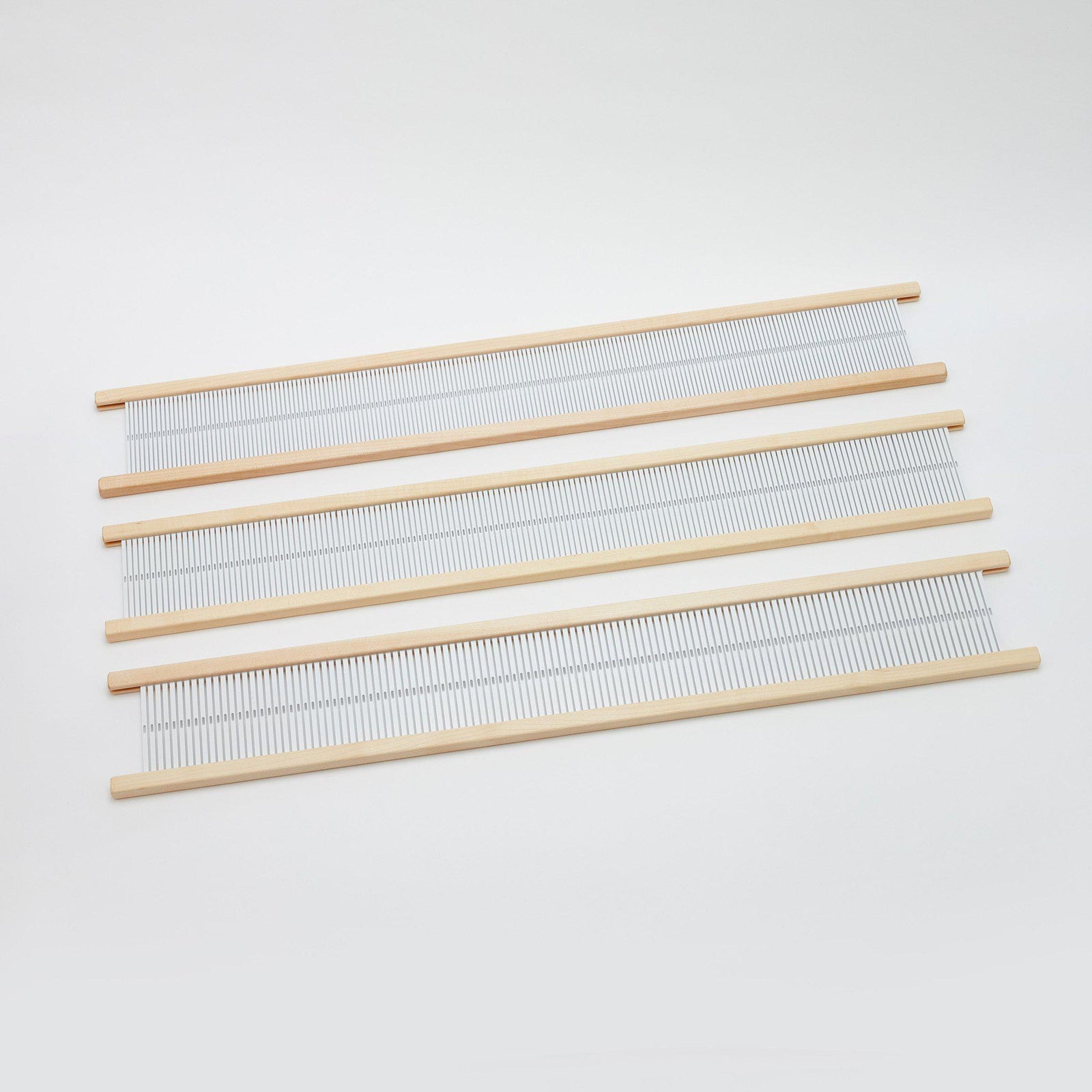 rigid heddles
