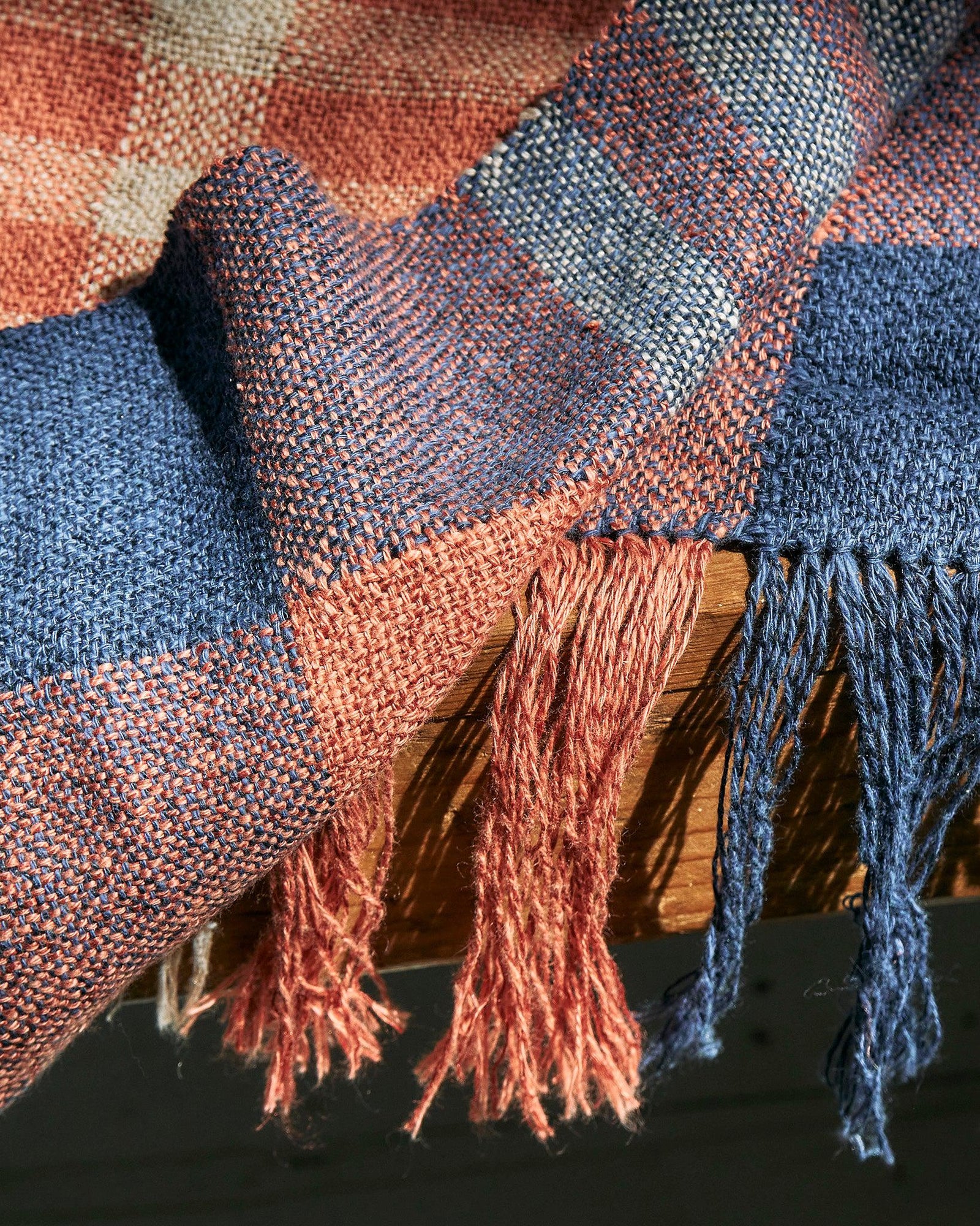 Duet Favorites - Set of Two Patterns featuring woven scarf and towels in blue and rust with fringe edges.
